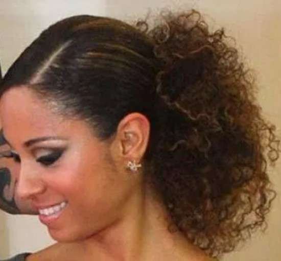 Penteado de festa cabelo cacheado.