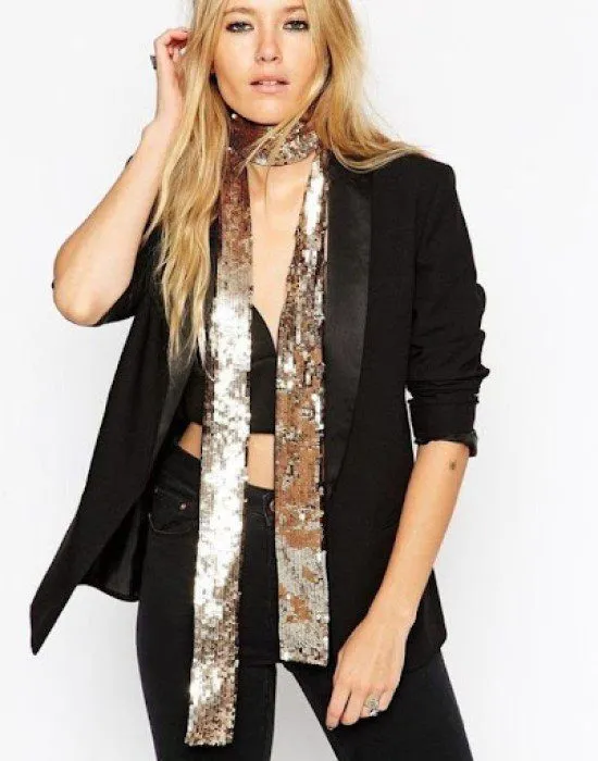 Skinny scarf de paetês.