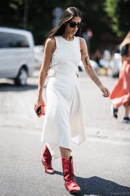 Look com botas country.